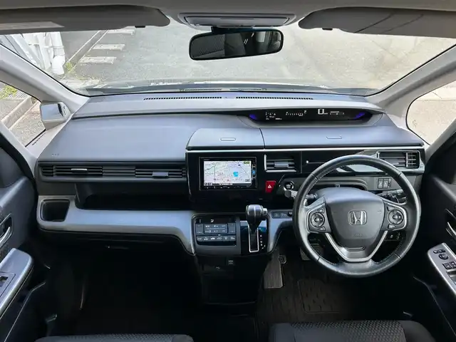 ホンダ ステップワゴン スパーダ ホンダセンシング 静岡県 2019(令1)年 3.9万km プレミアムスパークルブラックパール ホンダセンシング/純正7インチナビ/FM/AM/フルセグTV/Bluetooth/iPod/SD/3列シート（7人乗り）/追従クルーズコントロール/両側パワースライドドア/ターボエンジン/バックカメラ/ETC/純正フロアマット/LEDヘッドライト/オートライト/オートハイビーム/純正16AW