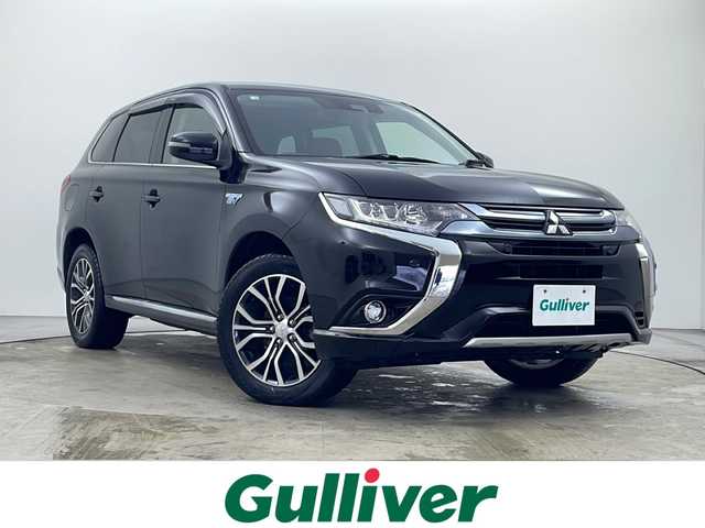 三菱 アウトランダー ＰＨＥＶ G Limited Edition 秋田県 2018(平30)年 5.2万km アメジストブラック 4WD/プラグインハイブリッド/社外ナビ（CD/DVD/BD/BT/フルセグ）/バックカメラ/オートクルーズコントロール/LDW（車線逸脱警報）/前席シートヒーター/ステアリングヒーター/D席パワーシート/パドルシフト/AC100V1500W/社外エンジンスターター/ブレーキホールド/コーナーセンサー/スマートキー/LEDヘッドライト/オートハイビーム/充電ケーブルあり/取説・保証書