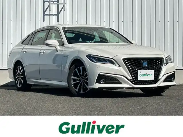 トヨタ クラウン ハイブリッド G 熊本県 2018(平30)年 4.4万km ホワイトパールクリスタルシャイン 純正ナビ/・AM/FM/CD/DVD/BT/・フルセグTV/・TVキャンセラー/・全方位カメラ/デジタルインナーミラーー/トヨタセーフティーセンス/・プリクラッシュセーフティ/・レーダークルーズコントロール/・レーントレーシングアシスト/・オートマチックハイビーム/・ロードサインアシスト/・ドライバー異常対応システム/・リクロストラフィックアラート/ヘッドアップディスプレイ/ブラインドスポットミニター/電動パーキングブレーキ/・ブレーキホールド/LEDライト/・フォグランプ/走行モード切替/・ECO/ノーマル/sports/snow/EV/電動格納ミラー/・ウィンカーミラー/革巻きステアリング/・ステアリングスイッチ/・オートアウェイ機能/革シート/D＋N席パワーシート/・ドライビングポジション・メモリー/前席シートヒーター/ビルトインETC/前方ドライブレコーダー/純正17インチAW/純正フロアマット/プッシュスタート/・スマートキー
