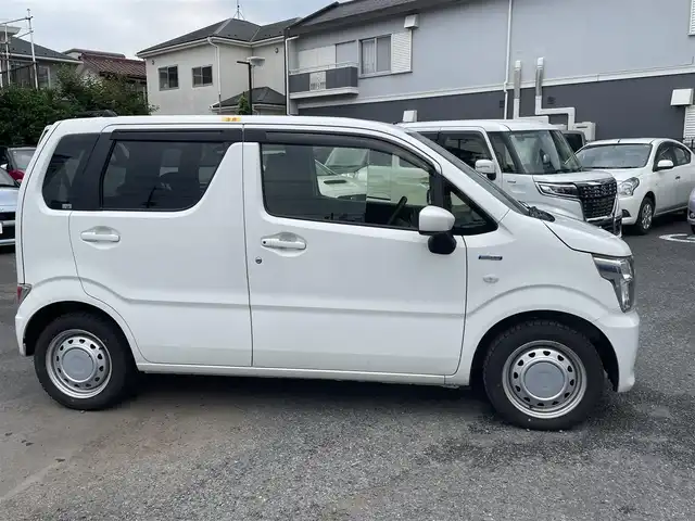 スズキ ワゴンＲ HYBRID FX 埼玉県 2020(令2)年 8.4万km スペリアホワイト (株)IDOMが運営する【じしゃロン川越店】の自社ローン専用車両になります。こちらは現金またはオートローンご利用時の価格です。自社ローンご希望の方は別途その旨お申付け下さい/社外ナビ　NXR16III/Bluetooth/CD/衝突軽減ブレーキ/レーンキープアシスト/ETC/シートヒーター/スマートキー（スペア×１）/プッシュスタート/ドアバイザー/純正フロアマット/サマータイヤ＆ホイールキャップ付き車載