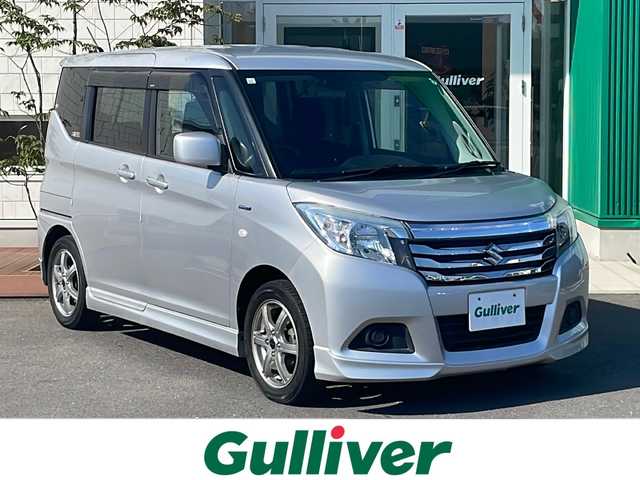 スズキ ソリオ HV MX Dカメラ ブレーキS 青森県 2015(平27)年 16.7万km スターシルバーメタリック 4WD/ワンオーナー/純正CDオーディオ/左パワースライドドア/前席シートヒーター/クルーズコントロール/デュアルカメラブレーキサポート/レーンキープアシスト/横滑り防止機能/スマートキー/プッシュスタート/スペアキー/保証書・取説書