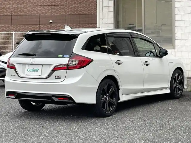 ホンダ ジェイド ハイブリッド RS ホンダセンシング 福岡県 2019(平31)年 3.1万km プラチナホワイトパール 無限ドアハンドルプロテクター/黒ハーフレザーシート/純正メモリナビGathers【VXM-194VFi】/(AM/FM/Bluetooth/CD/DVD/フルセグTV】/ビルトインETC/バックカメラ/パドルシフト/オートライト/衝突軽減ブレーキ(CMBS)/路外逸脱抑制/アダプティブクルーズコントロール/車両接近通報装置/車線維持支援システム(LKAS)/クリアランスソナー/コーナーセンサー/盗難防止装置/横滑り防止機能/電格ウィンカーミラー/プッシュスタート/純正フロアマット/純正１８インチアルミホイール/ステアリングスイッチ/フロントフォグランプ/ドアバイザー/純正前方ドライブレコーダーGathers【DRH-189N】/ナビ取扱説明書/ドラレコ取扱説明書/取扱説明書/保証書