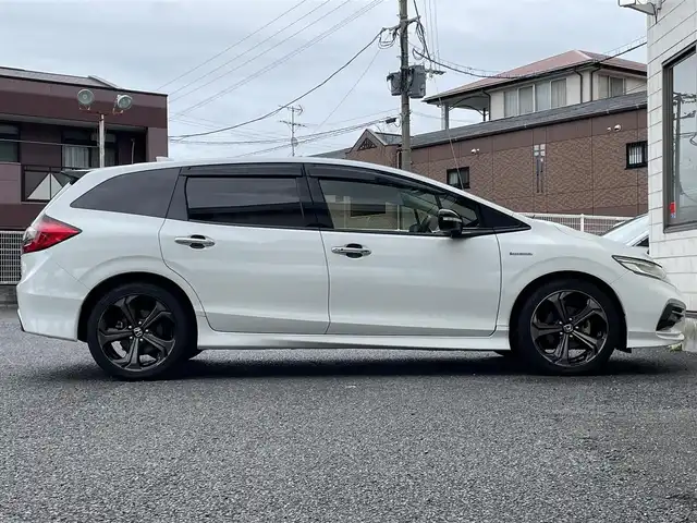ホンダ ジェイド ハイブリッド RS ホンダセンシング 福岡県 2019(平31)年 3.1万km プラチナホワイトパール 無限ドアハンドルプロテクター/黒ハーフレザーシート/純正メモリナビGathers【VXM-194VFi】/(AM/FM/Bluetooth/CD/DVD/フルセグTV】/ビルトインETC/バックカメラ/パドルシフト/オートライト/衝突軽減ブレーキ(CMBS)/路外逸脱抑制/アダプティブクルーズコントロール/車両接近通報装置/車線維持支援システム(LKAS)/クリアランスソナー/コーナーセンサー/盗難防止装置/横滑り防止機能/電格ウィンカーミラー/プッシュスタート/純正フロアマット/純正１８インチアルミホイール/ステアリングスイッチ/フロントフォグランプ/ドアバイザー/純正前方ドライブレコーダーGathers【DRH-189N】/ナビ取扱説明書/ドラレコ取扱説明書/取扱説明書/保証書