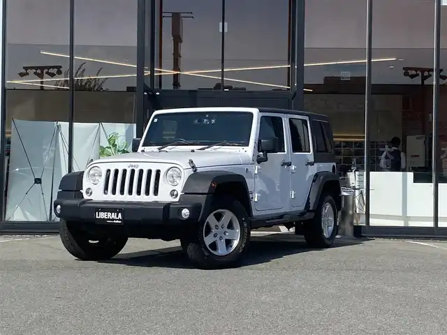 クライスラー・ジープ ジープ ラングラー アンリミテッド スポーツ 福岡県 2016(平28)年 8.8万km ブライトホワイトクリアコート ・クルーズコントロール/・純正ナビ／ＢＴ／ＵＳＢ/・バックカメラ/・ドライブレコーダー/・フルセグ/・ＥＴＣ/・純正１７ＡＷ/・サイドカメラ/・保証書/・取扱説明書