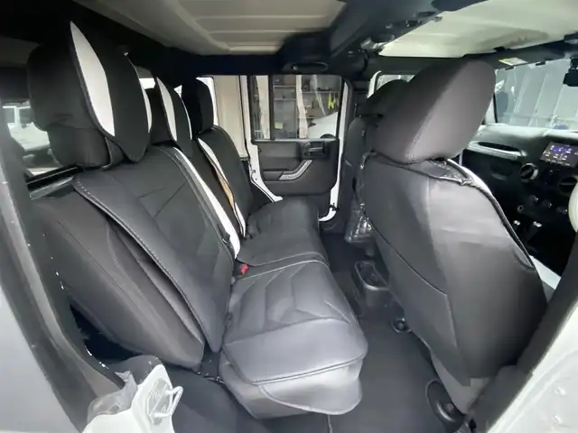 クライスラー・ジープ ジープ ラングラー アンリミテッド スポーツ 福岡県 2016(平28)年 8.8万km ブライトホワイトクリアコート ・クルーズコントロール/・純正ナビ／ＢＴ／ＵＳＢ/・バックカメラ/・ドライブレコーダー/・フルセグ/・ＥＴＣ/・純正１７ＡＷ/・サイドカメラ/・保証書/・取扱説明書