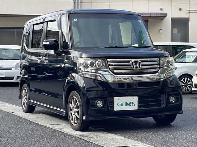 ホンダ Ｎ ＢＯＸ カスタム G ターボパッケージ 岡山県 2012(平24)年 12.3万km クリスタルブラックパール 登録時走行距離122469km/純正SDナビ/(AM/FM/TV/DISC/BT)/両側パワースライドドア/クルーズコントロール/ETC/パドルシフト/S+Rエアロ/社外１４インチアルミホイール/プッシュスタート/スマートキー/スペアキー/パワーウィンドウ/パワーステアリング/電動格納ミラー