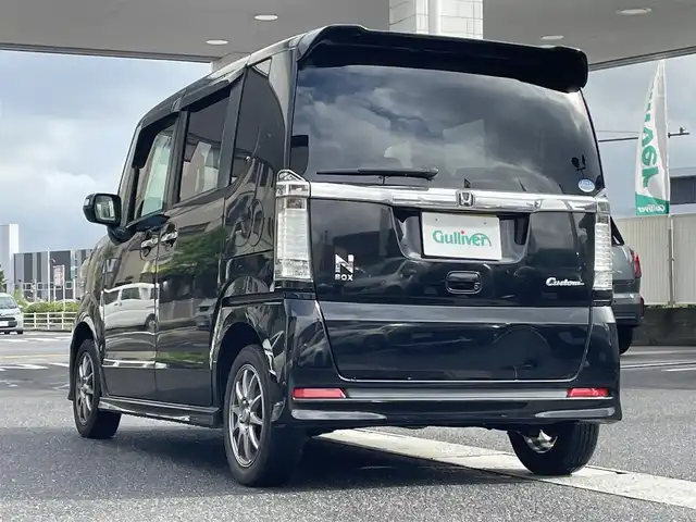 ホンダ Ｎ ＢＯＸ カスタム G ターボパッケージ 岡山県 2012(平24)年 12.3万km クリスタルブラックパール 登録時走行距離122469km/純正SDナビ/(AM/FM/TV/DISC/BT)/両側パワースライドドア/クルーズコントロール/ETC/パドルシフト/S+Rエアロ/社外１４インチアルミホイール/プッシュスタート/スマートキー/スペアキー/パワーウィンドウ/パワーステアリング/電動格納ミラー