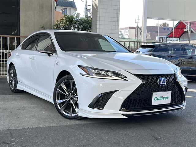 レクサス ＥＳ 300h Fスポーツ 京都府 2021(令3)年 8.9万km ホワイトノーヴァガラスフレーク 純正12.3インチディスプレイナビ/アラウンドビューモニター/Miracast/Bluetooth/TRDエアロ/TRDスポーツマフラー/サンルーフ/3眼LEDヘッドライト/デジタルアウターミラー/デジタルインナーミラー/メモリーパワーシート/シートヒーター＆ベンチレーション/ステアリングヒーター/ワイヤレス充電/パドルシフト/ドラレコ前後/レクサスセーフティーセンス/ブラインドスポットモニター/ヘッドアップディスプレイ/クリアランスソナー/レーンキープアシスト/パーキングサポートアラート/ブレーキホールド/ETC2.0/アイドリングストップ