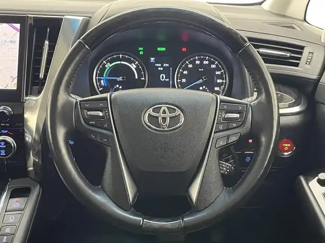 トヨタ アルファードハイブリット SR Cパッケージ 愛知県 2021(令3)年 4.8万km ホワイトパールクリスタルシャイン 純１０型ＤＡナビ　フルセグＴＶ　全方位カメラ　ＴＲＤエアロ　ＪＢＬサウンド　ツインムーンルーフ　純１３型後席モニター　ベンチレーション　黒革　３眼ＬＥＤヘッドライト　電動リアゲート　ＥＴＣ２．０　禁煙　トヨタセーフティセンス　衝突軽減　オートハイビーム　BSM　シートヒーター　/ユーザー買取/TRDフルエアロ/SR/JBL/フリップダウン/イルミ加工/パワーバックドア自動加工/両側Pスライド/プリクラッシュ/3眼LED/シーケンシャル/純正メモリナビ/全周囲カメラ/スペアキー/シートH/ベンチレーション/プリクラッシュ/記録簿