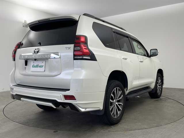 トヨタ ランドクルーザー プラド TX Lパッケージ 兵庫県 2020(令2)年 2.3万km ホワイトパールクリスタルシャイン ・モデリスタエアロ/・プリクラッシュセーフティ/・レーンディパーチャーアラート/・オートマチックハイビーム/・レーダークルーズコントロール（ブレーキ制御付）/・クリアランスソナー &バックソナー/・LEDヘッドランプ［ハイ・ロービーム］/・オートレベリング機能付/・LEDクリアランスランプ（デイライト機能付）/・ヘッドランプクリーナー/・ルーフレール/・純正9型ナビ＆TV＆BT＆DVD＆HDMI＆CD/・バックカメラ/・前後ドライブレコーダー/・ビルトインETC2.0/・スマートキー/・スペアキー/・プッシュスタート/・ステアリングリモコン/・黒革シート/・前席パワーシート/・前席シートヒーター/・前席シートクーラー/・フォグランプ/・オートライト/・純正フロアマット/・純正19インチアルミホイール/・横滑り防止装置