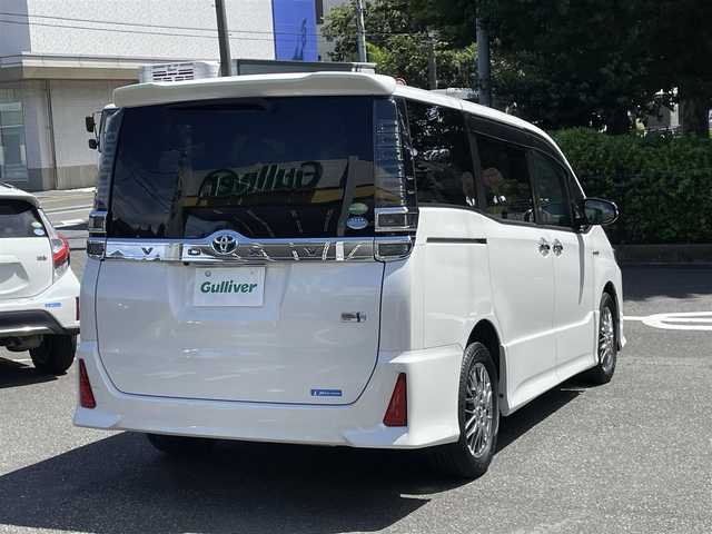 トヨタ ヴォクシー ハイブリッド ZS 煌 神奈川県 2018(平30)年 3万km ホワイトパールクリスタルシャイン ワンオーナー/セイフティセンス/クルーズコントロール/両側パワースライドドア/ディーラーOPナビ/CD/DVD/Bluetooth/地デジ/バックカメラ/ETC/LEDヘッドライト/フリップダウンモニター/スマートキー/保証書/取説/スペアキーあり