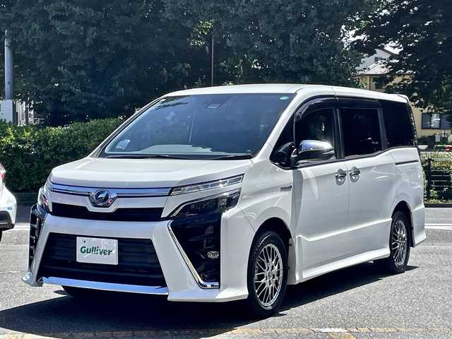 トヨタ ヴォクシー ハイブリッド ZS 煌 神奈川県 2018(平30)年 3万km ホワイトパールクリスタルシャイン ワンオーナー/セイフティセンス/クルーズコントロール/両側パワースライドドア/ディーラーOPナビ/CD/DVD/Bluetooth/地デジ/バックカメラ/ETC/LEDヘッドライト/フリップダウンモニター/スマートキー/保証書/取説/スペアキーあり