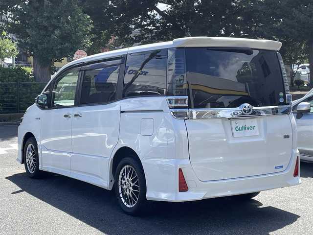 トヨタ ヴォクシー ハイブリッド ZS 煌 神奈川県 2018(平30)年 3万km ホワイトパールクリスタルシャイン ワンオーナー/セイフティセンス/クルーズコントロール/両側パワースライドドア/ディーラーOPナビ/CD/DVD/Bluetooth/地デジ/バックカメラ/ETC/LEDヘッドライト/フリップダウンモニター/スマートキー/保証書/取説/スペアキーあり