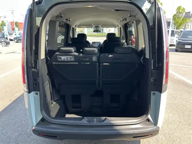 ホンダ ステップワゴン エアー 愛媛県 2022(令4)年 1.5万km フィヨルドミストパール ETC/社外ナビ/3列シート/バックカメラ/LEDヘッドライト/両側パワースライドドア/クルーズコントロール/エンジンスタートボタン/コーナーセンサー