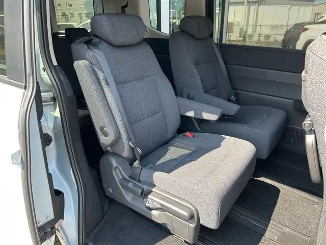ホンダ ステップワゴン エアー 愛媛県 2022(令4)年 1.5万km フィヨルドミストパール ETC/社外ナビ/3列シート/バックカメラ/LEDヘッドライト/両側パワースライドドア/クルーズコントロール/エンジンスタートボタン/コーナーセンサー