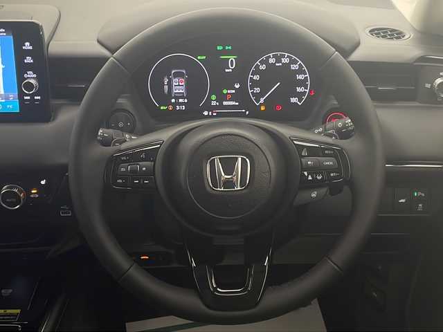 ホンダ ヴェゼル ハイブリッド e:HEV Z 宮崎県 2025(令7)年 0.1千km プラチナホワイトパール 登録済み未使用車/ホンダセンシング/純正9型ディスプレイオーディオナビTV/（Honda CONNECT/Bluetooth/FMAM/HDMI/フルセグTV)/純正ビルトイン2.0ETC/純正ワイヤレス充電器/純正LEDオートライト/純正LEDフォグ/純正18インチアルミ/アダプティブクルーズコントロール/レーンディパーチャーアラート/ダウンヒルアシストコントロール/ブラインドスポットモニター/クリアランスソナー/パワーバックドア/電子パーキング/オートホールド/パドルシフト/本革巻ハンドル/ハーフレザーシート/前席シートヒーター/ステアリングヒーター/デュアルオートエアコン/スマートキー/プッシュエンジンスタート/スペアキー/新車時保証書/取扱い説明書