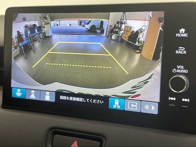 ホンダ ヴェゼル ハイブリッド e:HEV Z 宮崎県 2025(令7)年 0.1千km プラチナホワイトパール 登録済み未使用車/ホンダセンシング/純正9型ディスプレイオーディオナビTV/（Honda CONNECT/Bluetooth/FMAM/HDMI/フルセグTV)/純正ビルトイン2.0ETC/純正ワイヤレス充電器/純正LEDオートライト/純正LEDフォグ/純正18インチアルミ/アダプティブクルーズコントロール/レーンディパーチャーアラート/ダウンヒルアシストコントロール/ブラインドスポットモニター/クリアランスソナー/パワーバックドア/電子パーキング/オートホールド/パドルシフト/本革巻ハンドル/ハーフレザーシート/前席シートヒーター/ステアリングヒーター/デュアルオートエアコン/スマートキー/プッシュエンジンスタート/スペアキー/新車時保証書/取扱い説明書