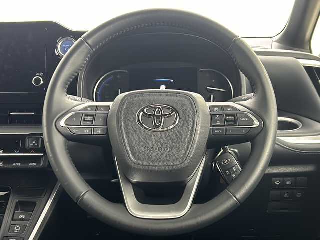 トヨタ ヴォクシー ハイブリッド S－Z 熊本県 2023(令5)年 0.5万km メタルストリームM 禁煙車/両側パワースライドドア/衝突被害軽減ブレーキ/レーンキープアシスト/追従式クルーズコントロール/純正ナビ/AM/FM/Bluetooth/USB/Miracast/バックカメラ/ハーフレザーシート/シートヒーターD/N/コーナーセンサー前後/LEDヘッドライト/ビルトインETC/オートライト/オートマチックハイビーム/カーテンエアバッグ/ステアリングリモコン/フォグランプ/ドライブレコーダー前後/スマートキー/スペアキー有/ABS/横滑り防止装置/保証書/取扱説明書