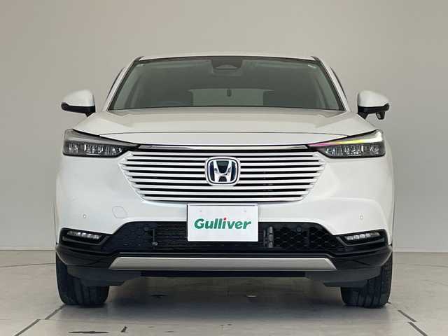 ホンダ ヴェゼル ハイブリッド e:HEV Z 愛知県 2021(令3)年 2.9万km プラチナホワイトパール ホンダセンシング/純正9型ディスプレイオーディオナビ/レーダークルーズコントロール/シートヒーター/バックカメラ/電動リアゲート/コーナーセンサー/純正アルミホイール/ブラインドスポットモニター/LEDヘッドライト/パドルシフト/ステアリングヒーター/オートマチックハイビーム/ドライブレコーダー/ETC/衝突軽減システム/フルセグ/CD DVD/Bluetooth