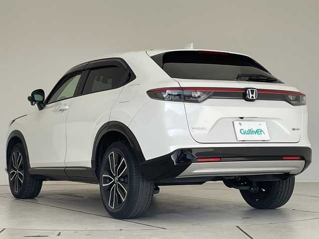 ホンダ ヴェゼル ハイブリッド e:HEV Z 愛知県 2021(令3)年 2.9万km プラチナホワイトパール ホンダセンシング/純正9型ディスプレイオーディオナビ/レーダークルーズコントロール/シートヒーター/バックカメラ/電動リアゲート/コーナーセンサー/純正アルミホイール/ブラインドスポットモニター/LEDヘッドライト/パドルシフト/ステアリングヒーター/オートマチックハイビーム/ドライブレコーダー/ETC/衝突軽減システム/フルセグ/CD DVD/Bluetooth