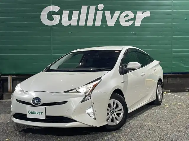 トヨタ プリウス Sセーフティプラス 東京都 2018(平30)年 1.5万km ホワイトパールクリスタルシャイン 純正SDナビ【NSZT-Y68T】/(/DVD/フルセグTV/SD/Bluetooth)/セーフティーセンスP/・プリクラッシュセーフティー/・レーンディパーチャーアラート/・オートハイビーム/・レーダークルーズコントロール/インテリジェントクリアランスソナー/シンプルインテリジェントパーキングアシスト/LEDヘッドランプ/LEDフロントフォグランプ/カラーグラフィックメーター/カラーマルチインフォメーションディスプレイ/オートエアコン/取扱説明書/保証書/スペアキー×1