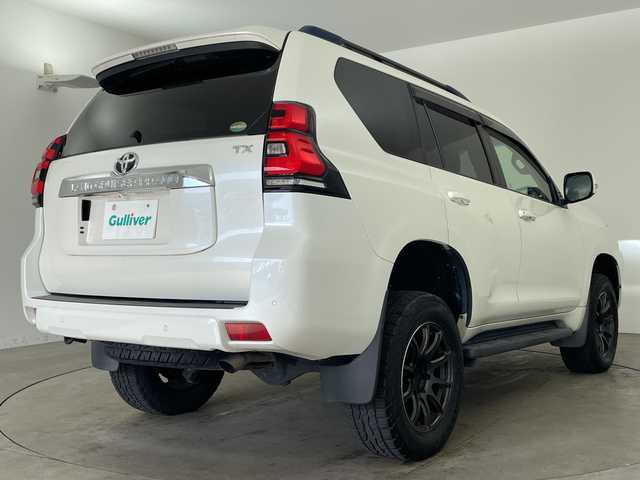 トヨタ ランドクルーザー プラド TX 兵庫県 2018(平30)年 6.4万km ホワイトパールクリスタルシャイン ・社外ナビ/CD/DVD/SD/TV/Bluetooth/・バックカメラ/・ビルトインETC/・ドライブレコーダー/・Toyota　Safety　Sense/・プリクラッシュセーフティ/・レーンディパーチャーアラート/・オートマチックハイビーム/・レーダークルーズコントロール/・VSC/・アクティブトラクションコントロール/・ダウンヒルアシストコントロール/・ヒルスタートアシストコントロール/・ハイドロブレーキブースター/・電動センターデフロック/・ＬＥＤヘッドライト/・フォグランプ/・オートライト/・RAYS製gram LIGHTSアルミホイール/・JAOS BATTLEZ リフトアップ/・スマートキー