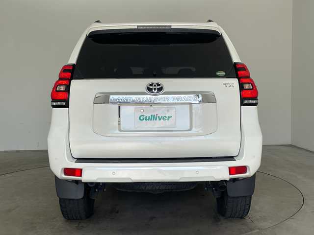 トヨタ ランドクルーザー プラド TX 兵庫県 2018(平30)年 6.4万km ホワイトパールクリスタルシャイン ・社外ナビ/CD/DVD/SD/TV/Bluetooth/・バックカメラ/・ビルトインETC/・ドライブレコーダー/・Toyota　Safety　Sense/・プリクラッシュセーフティ/・レーンディパーチャーアラート/・オートマチックハイビーム/・レーダークルーズコントロール/・VSC/・アクティブトラクションコントロール/・ダウンヒルアシストコントロール/・ヒルスタートアシストコントロール/・ハイドロブレーキブースター/・電動センターデフロック/・ＬＥＤヘッドライト/・フォグランプ/・オートライト/・RAYS製gram LIGHTSアルミホイール/・JAOS BATTLEZ リフトアップ/・スマートキー
