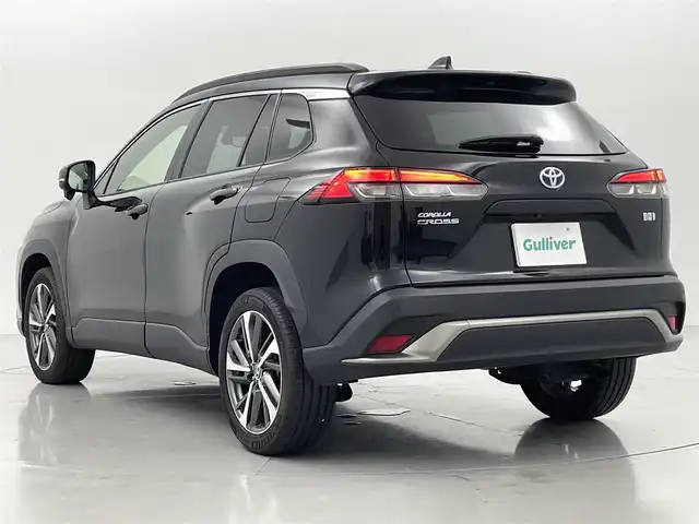 トヨタ カローラ クロス ハイブリッド Z 熊本県 2022(令4)年 1.4万km アティチュードブラックマイカ 禁煙車/9インチディスプレイオーディオ（ApplCarPlay・AndroidAuto・BT・フルセグ・USB）/バックカメラ/社外前後ドライブレコーダー/トヨタセーフティセンス/・プリクラッシュセーフティ/・レーンキープアシスト/・オートハイビーム/・アダプティブクルーズコントロール/・ブラインドスポットモニター/パワーバックドア/前後クリアランスソナー/電動パーキングブレーキ/オートブレーキホールド/ステアリングスイッチ/ハーフレザーシート/前席シートヒーター/オートライト/LEDヘッドライト/フォグライト/スマートキー/プッシュスタート/保証書