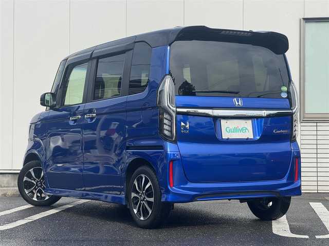 ホンダ Ｎ ＢＯＸ カスタム G L ホンダセンシング 三重県 2020(令2)年 5.9万km ブリリアントスポーティブルーメタリック2トーン 2トーンカラー(ルーフブラック)/シートカバー(クラッツィオ)/シートヒーター(前席)/ナビ(Bluetooth/CD/DVD/SD/地デジTV/MEMORYMUSIC/AM/FM)/バックカメラ/ETC/パワースライドドア(助手席側)/スライドドアイージークローザー(運転席側)/ホンダセンシング(衝突軽減ブレーキ/誤発進抑制/後方誤発進抑制/歩行者事故低減ステアリング/先行車発進お知らせ/アダプティブクルーズコントロール/車線維持支援/オートハイビーム/標識認識/路外逸脱抑制)/LEDヘッドランプ/LEDフロントフォグランプ/ロールサンシェイド(後席左右)/プッシュスタート/スマートキーシステム/スペアキー