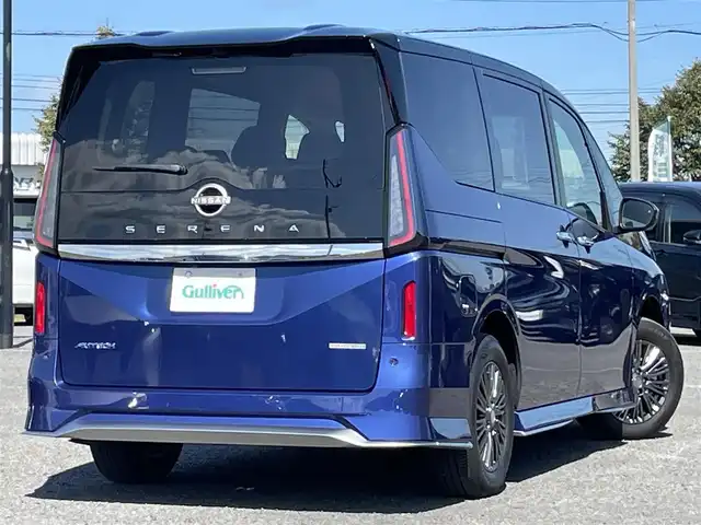 日産 セレナ オーテック 道央・札幌 2023(令5)年 1.2万km 青 ４WD/ワンオーナー/純正メーカーナビ/AM/FM/BT/フルセグ/純正フリップダウンモニター/エマージェンシーブレーキ/横滑り防止装置/レーダークルーズコントロール/レーンキープアシスト/ハンドル支援/クリアランスソナー/アラウンドビューモニター/ビルトインETC/アイドリングストップ/デジタルインナーミラー/両側パワースライドドア/前席/2列目シートヒーター/レザーシート/革巻きステアリング/ステアリングリモコン/パドルシフト/ハンドルヒーター/置くだけ充電/電動パーキング/オートブレーキホールド/プッシュスタート/スマートキー/LEDヘッドライト/オートライト/オートハイビーム/フォグランプ/電動格納ミラー/ウィンカーミラー/純正フロアマット/スペアキー