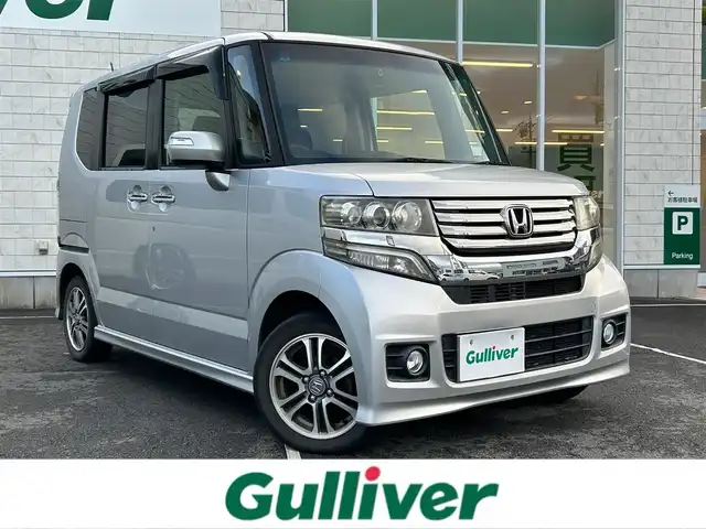 ホンダ Ｎ ＢＯＸ カスタム G 静岡県 2013(平25)年 9.3万km アラバスターシルバーメタリック 社外ナビ/（フルセグTV/Bluetooth/DVD）/バックカメラ/横滑り防止装置/ETC/前方ドライブレコーダー/両側スライドドア/オートライト/プッシュスタート/スマートキー/純正フロアマット/保証書/取扱説明書