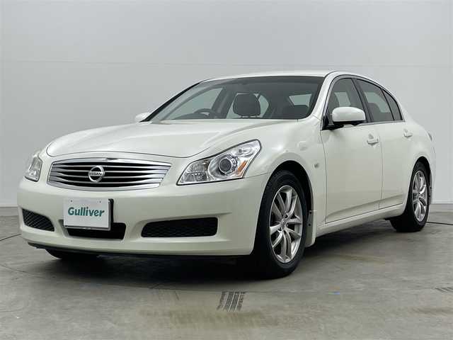 日産 スカイライン 250GT Type V 岡山県 2006(平18)年 3.1万km ホワイトパール 純正HDDナビ/（CD/DVD/TV/BT)/バックカメラ/ステアリングリモコン/ETC/HIDヘッドライト/オートライト/フォグランプ/パワーシート/ハーフレザーシート