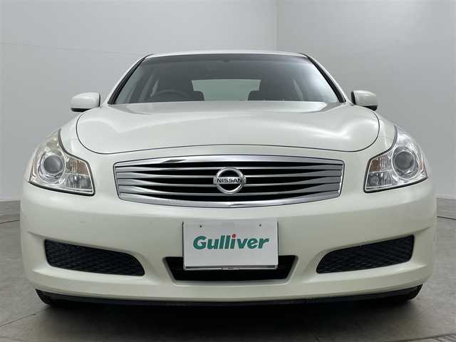 日産 スカイライン 250GT Type V 岡山県 2006(平18)年 3.1万km ホワイトパール 純正HDDナビ/（CD/DVD/TV/BT)/バックカメラ/ステアリングリモコン/ETC/HIDヘッドライト/オートライト/フォグランプ/パワーシート/ハーフレザーシート