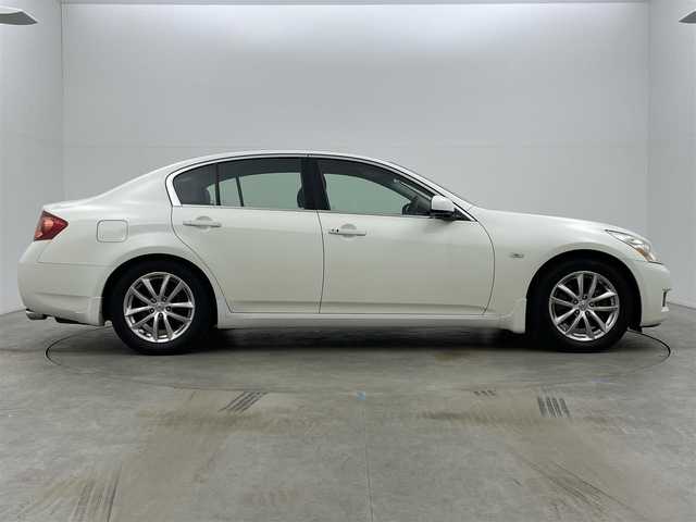 日産 スカイライン 250GT Type V 岡山県 2006(平18)年 3.1万km ホワイトパール 純正HDDナビ/（CD/DVD/TV/BT)/バックカメラ/ステアリングリモコン/ETC/HIDヘッドライト/オートライト/フォグランプ/パワーシート/ハーフレザーシート