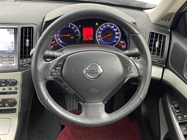 日産 スカイライン 250GT Type V 岡山県 2006(平18)年 3.1万km ホワイトパール 純正HDDナビ/（CD/DVD/TV/BT)/バックカメラ/ステアリングリモコン/ETC/HIDヘッドライト/オートライト/フォグランプ/パワーシート/ハーフレザーシート