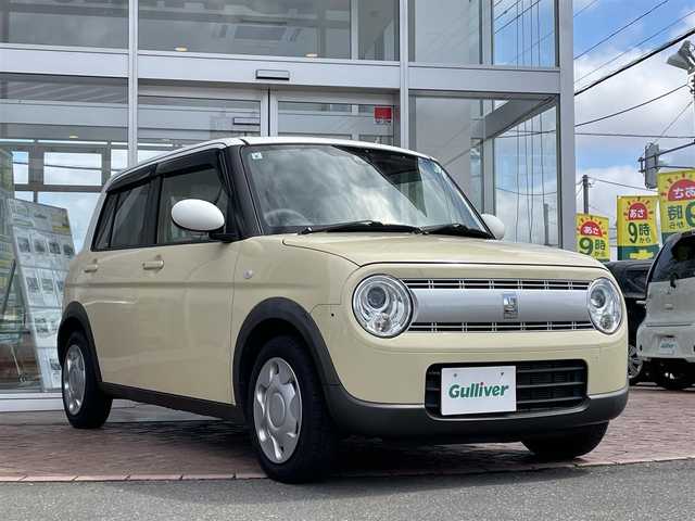 スズキ ラパン S 道央・札幌 2017(平29)年 6.5万km シフォンアイボリーメタリック ４ＷＤ/純正オーディオ(AM/FM/CD)/アイドリングストップ/ドアバイザー/プッシュスタート/シートヒーター/純正シートカバー付/純正フロアマット/横滑り防止装置/盗難防止装置/衝突軽減ブレーキ/オートライト/積込夏タイヤ/　　(社外AW付 155/65R14 21年製 溝５ｍｍ)
