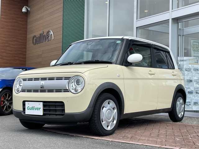スズキ ラパン S 道央・札幌 2017(平29)年 6.5万km シフォンアイボリーメタリック ４ＷＤ/純正オーディオ(AM/FM/CD)/アイドリングストップ/ドアバイザー/プッシュスタート/シートヒーター/純正シートカバー付/純正フロアマット/横滑り防止装置/盗難防止装置/衝突軽減ブレーキ/オートライト/積込夏タイヤ/　　(社外AW付 155/65R14 21年製 溝５ｍｍ)