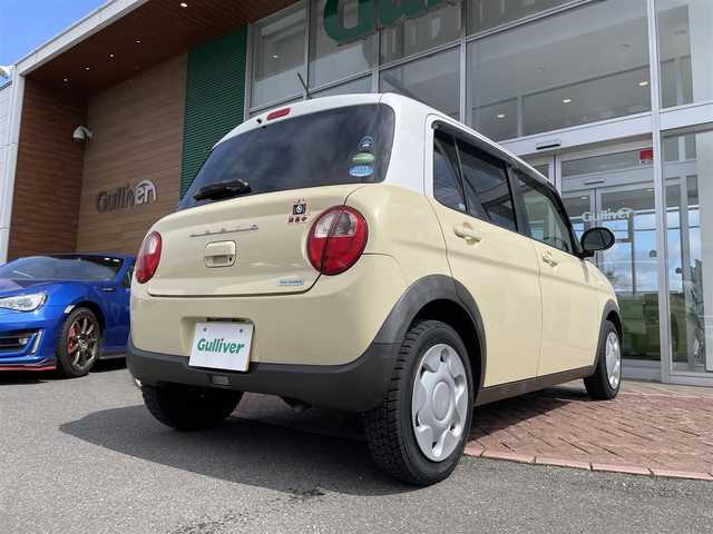 スズキ ラパン S 道央・札幌 2017(平29)年 6.5万km シフォンアイボリーメタリック ４ＷＤ/純正オーディオ(AM/FM/CD)/アイドリングストップ/ドアバイザー/プッシュスタート/シートヒーター/純正シートカバー付/純正フロアマット/横滑り防止装置/盗難防止装置/衝突軽減ブレーキ/オートライト/積込夏タイヤ/　　(社外AW付 155/65R14 21年製 溝５ｍｍ)