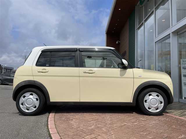 スズキ ラパン S 道央・札幌 2017(平29)年 6.5万km シフォンアイボリーメタリック ４ＷＤ/純正オーディオ(AM/FM/CD)/アイドリングストップ/ドアバイザー/プッシュスタート/シートヒーター/純正シートカバー付/純正フロアマット/横滑り防止装置/盗難防止装置/衝突軽減ブレーキ/オートライト/積込夏タイヤ/　　(社外AW付 155/65R14 21年製 溝５ｍｍ)