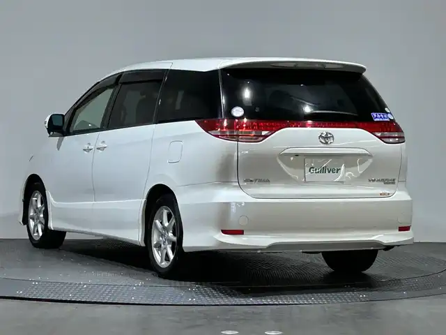 トヨタ エスティマ アエラス Gパッケージ 愛媛県 2006(平18)年 6.7万km パール 純正ＨＤＤナビバック・サイド・フロントカメラ　ＥＴＣ　純正フロアマット　純アルミホイール　ハロゲンヘッドライト　三列シート　フラットシート　パワーシート　スマートキーＷＡＣクルーズコントロル