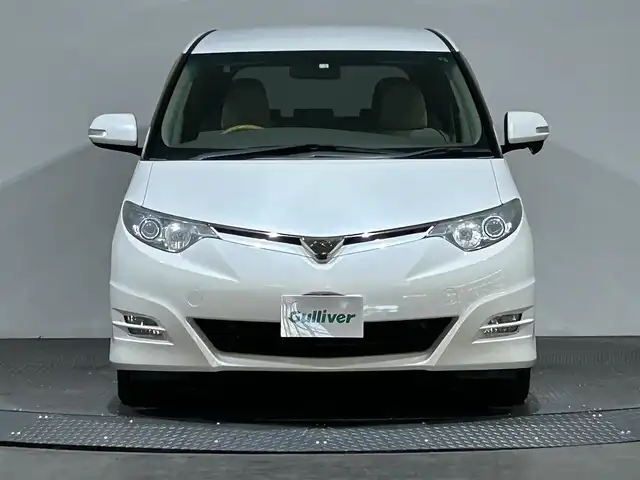 トヨタ エスティマ アエラス Gパッケージ 愛媛県 2006(平18)年 6.7万km パール 純正ＨＤＤナビバック・サイド・フロントカメラ　ＥＴＣ　純正フロアマット　純アルミホイール　ハロゲンヘッドライト　三列シート　フラットシート　パワーシート　スマートキーＷＡＣクルーズコントロル