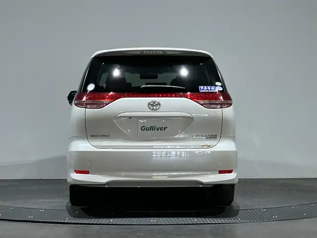 トヨタ エスティマ アエラス Gパッケージ 愛媛県 2006(平18)年 6.7万km パール 純正ＨＤＤナビバック・サイド・フロントカメラ　ＥＴＣ　純正フロアマット　純アルミホイール　ハロゲンヘッドライト　三列シート　フラットシート　パワーシート　スマートキーＷＡＣクルーズコントロル