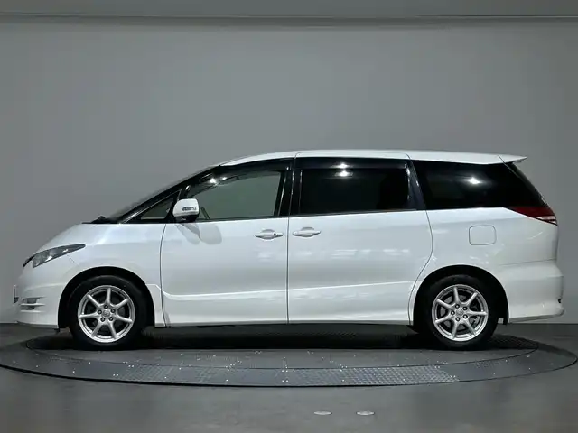 トヨタ エスティマ アエラス Gパッケージ 愛媛県 2006(平18)年 6.7万km パール 純正ＨＤＤナビバック・サイド・フロントカメラ　ＥＴＣ　純正フロアマット　純アルミホイール　ハロゲンヘッドライト　三列シート　フラットシート　パワーシート　スマートキーＷＡＣクルーズコントロル