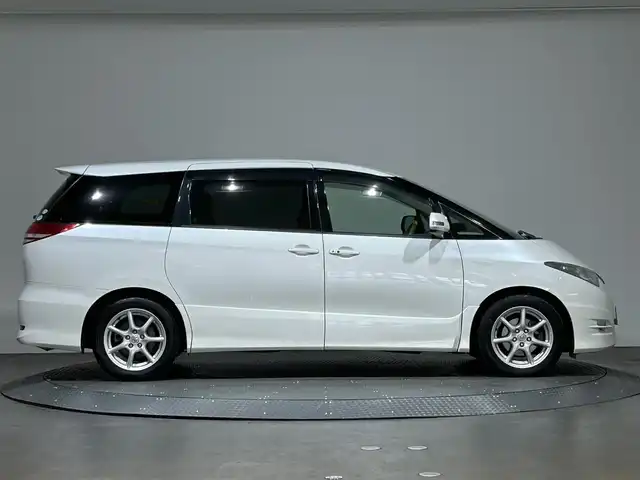 トヨタ エスティマ アエラス Gパッケージ 愛媛県 2006(平18)年 6.7万km パール 純正ＨＤＤナビバック・サイド・フロントカメラ　ＥＴＣ　純正フロアマット　純アルミホイール　ハロゲンヘッドライト　三列シート　フラットシート　パワーシート　スマートキーＷＡＣクルーズコントロル