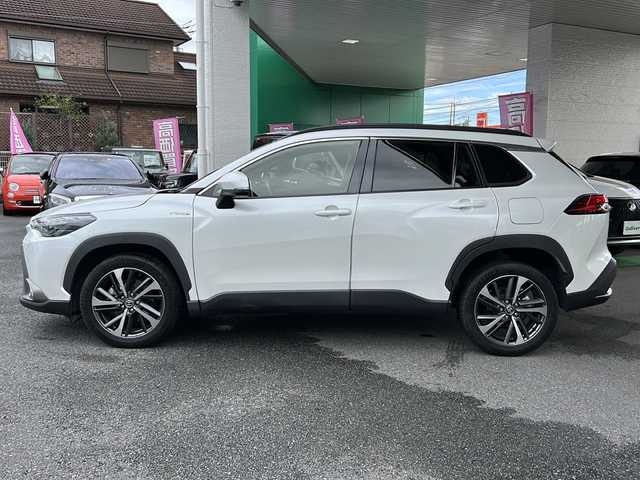 トヨタ カローラ クロス ハイブリッド Z 埼玉県 2021(令3)年 3.2万km プラチナホワイトパールマイカ ワンオーナー/メモリナビ/フルセグテレビ/バックカメラ/ウィンカーミラー/クルーズコントロール/サンルーフ/運転席エアバッグ/助手席エアバッグ/サイドエアバッグ/ＡＢＳ（アンチロックブレーキ）/トラクションコントロール/前席シートベルトプリテンショナー	/前席シートベルトフォースリミッター/後席３点式シートベルト/ブレーキアシスト/衝突安全ボディ/EBD	標準/盗難防止装置/その他安全装置(S-VSC)/ステアリングホイールテレスコピック機構/本革巻きステアリング