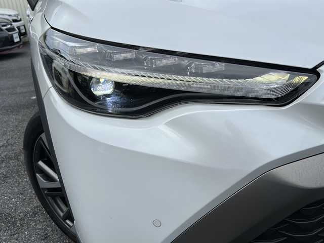 トヨタ カローラ クロス ハイブリッド Z 埼玉県 2021(令3)年 3.2万km プラチナホワイトパールマイカ ワンオーナー/メモリナビ/フルセグテレビ/バックカメラ/ウィンカーミラー/クルーズコントロール/サンルーフ/運転席エアバッグ/助手席エアバッグ/サイドエアバッグ/ＡＢＳ（アンチロックブレーキ）/トラクションコントロール/前席シートベルトプリテンショナー	/前席シートベルトフォースリミッター/後席３点式シートベルト/ブレーキアシスト/衝突安全ボディ/EBD	標準/盗難防止装置/その他安全装置(S-VSC)/ステアリングホイールテレスコピック機構/本革巻きステアリング
