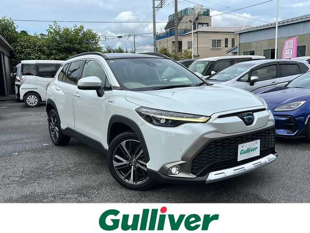 トヨタ カローラ クロス ハイブリッド Z 埼玉県 2021(令3)年 3.2万km プラチナホワイトパールマイカ ワンオーナー/メモリナビ/フルセグテレビ/バックカメラ/ウィンカーミラー/クルーズコントロール/サンルーフ/運転席エアバッグ/助手席エアバッグ/サイドエアバッグ/ＡＢＳ（アンチロックブレーキ）/トラクションコントロール/前席シートベルトプリテンショナー	/前席シートベルトフォースリミッター/後席３点式シートベルト/ブレーキアシスト/衝突安全ボディ/EBD	標準/盗難防止装置/その他安全装置(S-VSC)/ステアリングホイールテレスコピック機構/本革巻きステアリング