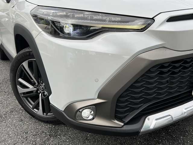 トヨタ カローラ クロス ハイブリッド Z 埼玉県 2021(令3)年 3.2万km プラチナホワイトパールマイカ ワンオーナー/メモリナビ/フルセグテレビ/バックカメラ/ウィンカーミラー/クルーズコントロール/サンルーフ/運転席エアバッグ/助手席エアバッグ/サイドエアバッグ/ＡＢＳ（アンチロックブレーキ）/トラクションコントロール/前席シートベルトプリテンショナー	/前席シートベルトフォースリミッター/後席３点式シートベルト/ブレーキアシスト/衝突安全ボディ/EBD	標準/盗難防止装置/その他安全装置(S-VSC)/ステアリングホイールテレスコピック機構/本革巻きステアリング