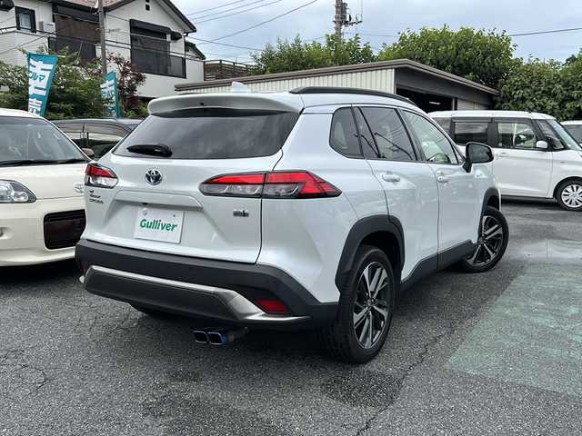 トヨタ カローラ クロス ハイブリッド Z 埼玉県 2021(令3)年 3.2万km プラチナホワイトパールマイカ ワンオーナー/メモリナビ/フルセグテレビ/バックカメラ/ウィンカーミラー/クルーズコントロール/サンルーフ/運転席エアバッグ/助手席エアバッグ/サイドエアバッグ/ＡＢＳ（アンチロックブレーキ）/トラクションコントロール/前席シートベルトプリテンショナー	/前席シートベルトフォースリミッター/後席３点式シートベルト/ブレーキアシスト/衝突安全ボディ/EBD	標準/盗難防止装置/その他安全装置(S-VSC)/ステアリングホイールテレスコピック機構/本革巻きステアリング