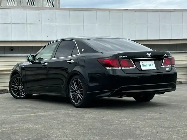 トヨタ クラウン ハイブリッド 静岡県 2015(平27)年 14.6万km ブラック 純正HDDナビ/（FM/AM/Bluetooth/CD）/フルセグTV/テレビキャンセラー/ブラックファブリックシート/前席パワーシート/前後ドラレコ/革巻きハンドル/ハンドルヒーター/フォグランプ/トランクイージークローザー/デュアルエアコン/純正ブラックスパッタリング塗装18AW/プッシュスタート/スマートキー